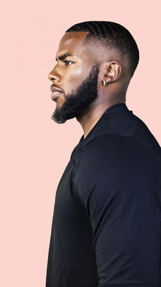 Side profile of a full beard after a hot towel shave